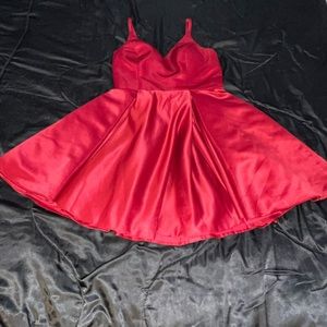 Burgundy mini dress with corset with corset on the back.